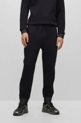 Stretch-cotton tracksuit bottoms with logo patch