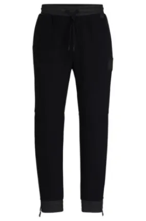 Stretch-cotton tracksuit bottoms with logo patch